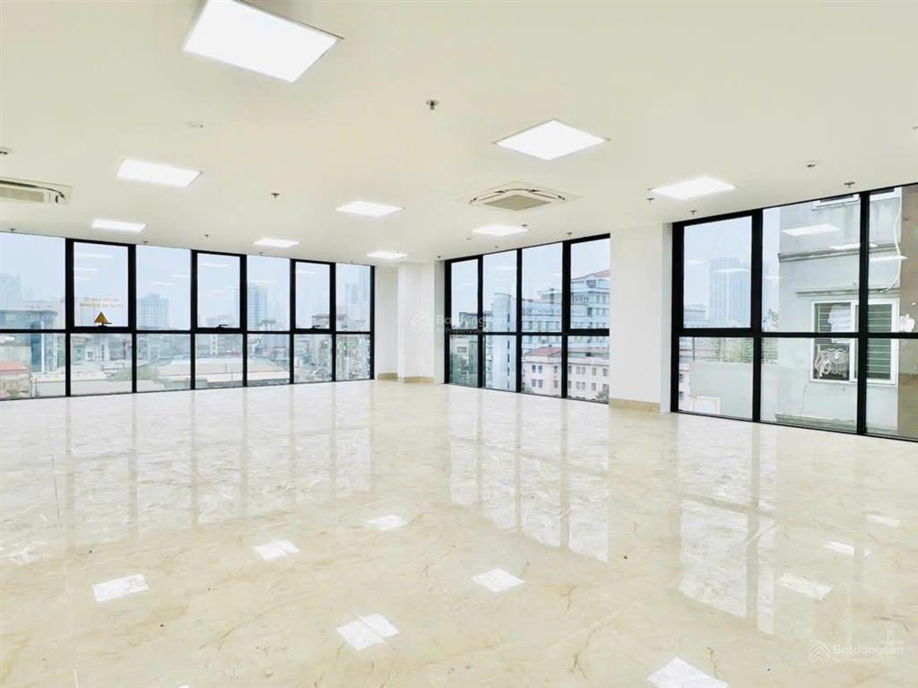 Toà building trung kính dt 105m2 x 9t mt 7m thông sàn, thang máy, vỉa hè rộng, mặt phố, dt 200tr/th