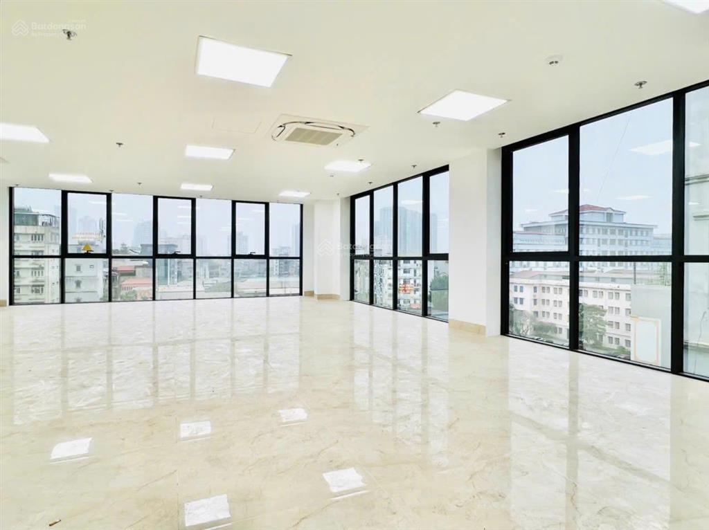 Toà building trung kính dt 105m2 x 9t mt 7m thông sàn, thang máy, vỉa hè rộng, mặt phố, dt 200tr/th