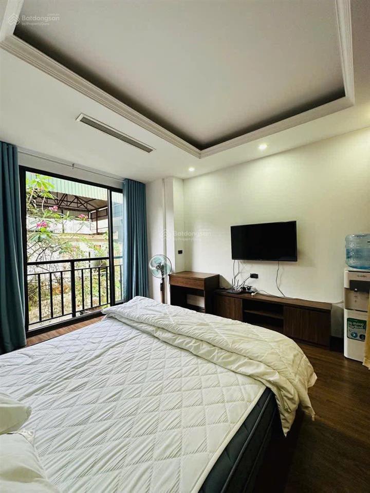 Tòa aparment mặt phố đội cấn. 8 nổi, 1 hầm, 16 chdv, dt 2tr/năm, 2 thoáng, pccc, hoàn công, 92m2*9t