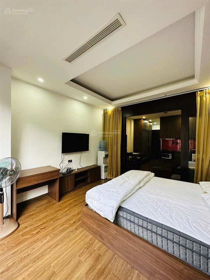 Tòa aparment mặt phố đội cấn. 8 nổi, 1 hầm, 16 chdv, dt 2tr/năm, 2 thoáng, pccc, hoàn công, 92m2*9t