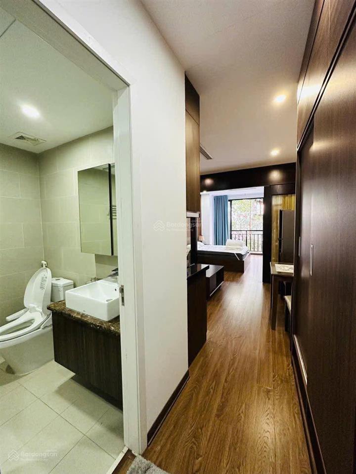 Tòa aparment mặt phố đội cấn. 8 nổi, 1 hầm, 16 chdv, dt 2tr/năm, 2 thoáng, pccc, hoàn công, 92m2*9t