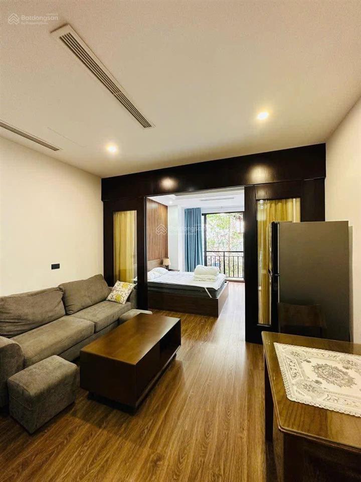 Tòa aparment mặt phố đội cấn. 8 nổi, 1 hầm, 16 chdv, dt 2tr/năm, 2 thoáng, pccc, hoàn công, 92m2*9t