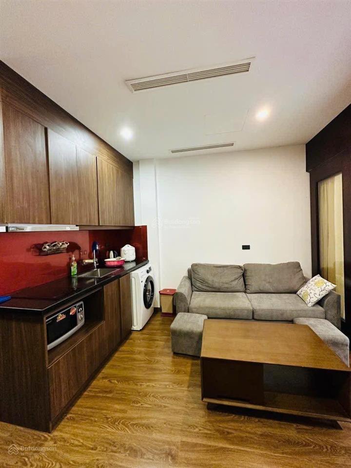 Tòa aparment mặt phố đội cấn. 8 nổi, 1 hầm, 16 chdv, dt 2tr/năm, 2 thoáng, pccc, hoàn công, 92m2*9t
