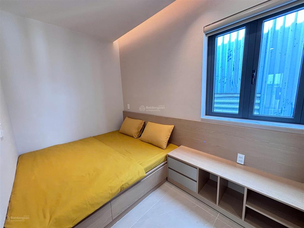 Nhà phố mới xây dựng (4x13)m, 1 trệt 3 lầu có sân để ô tô ngay an phú đông, gần đh nguyễn tất thành