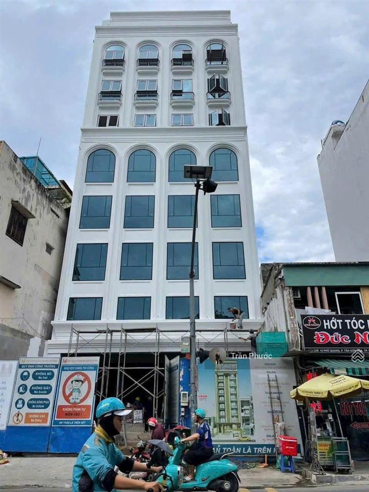 Tòa nhà 9  11  13 phổ quang, p.2, q. tân bình dt 12x34m kết cấu 2 hầm, 1 trệt, 10 lầu, tm, pccc