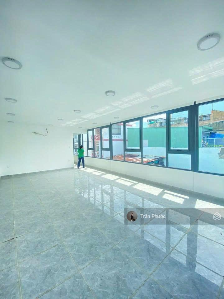 Tòa nhà 757 phan văn trị, p7, q. gò vấp dt 7 x 28.5m kc 01 hầm, 01 trệt, 01 lửng, 05 lầu, tm