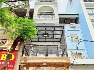 Mặt phố mai dịch 7 tầng thang máy thông sàn vỉa hè oto tránh mở được 2 mặt phố và ngõ sau 31 tỷ