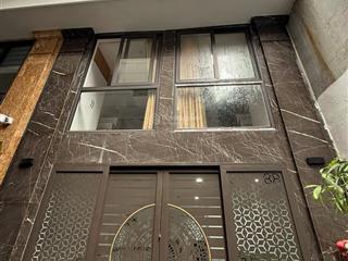 Căn hộ dịch vụ trần khát chân mới tinh 12 phòng dòng tiền 700tr/năm giá 21 tỷ  70m2x6t, mt 4.6m