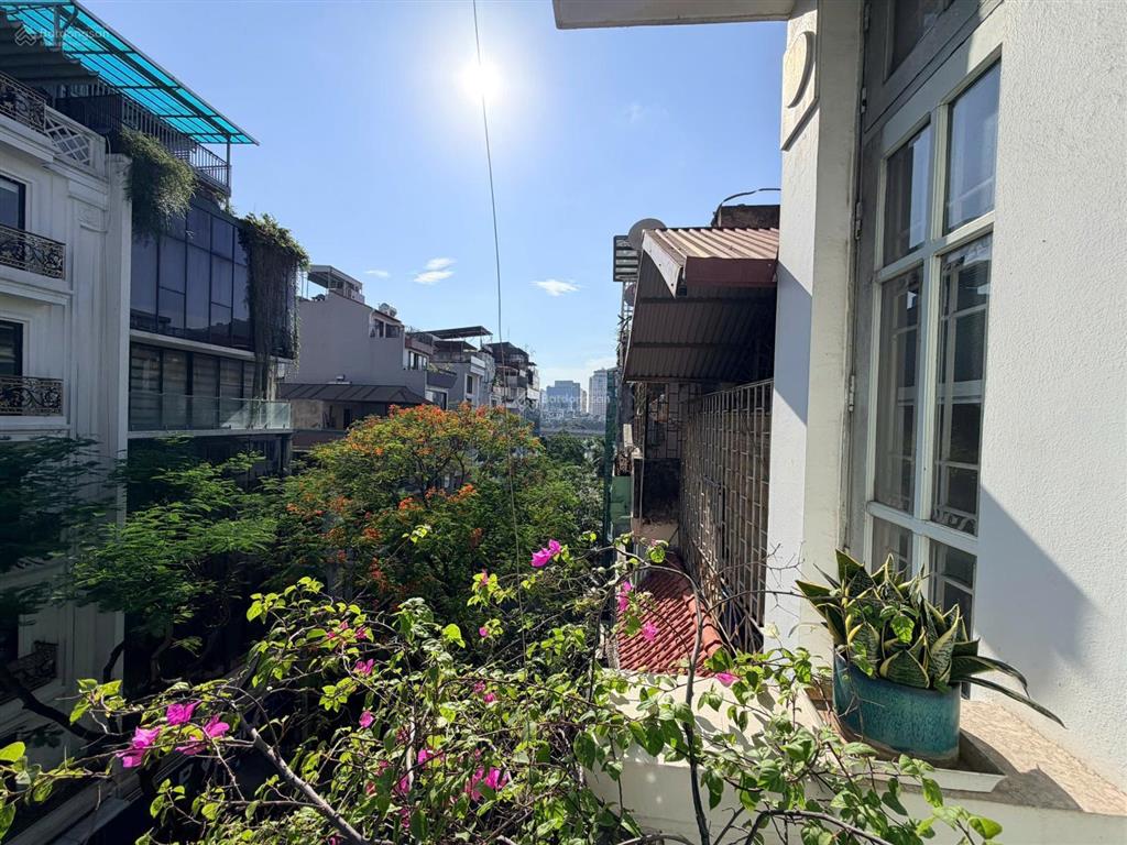 Mặt phố võ văn dũng  48m  9 tầng thang máy, cạnh hồ hoàng cầu