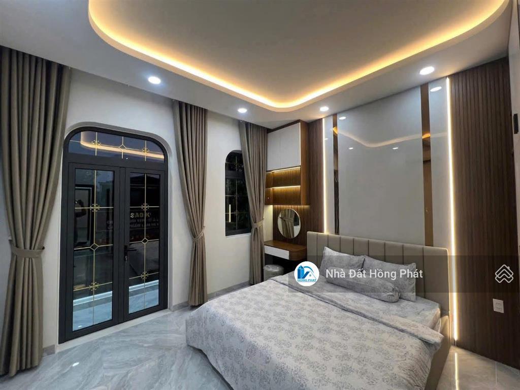 Nhà xinh 4m x 30m, mái đúc, đường thông 8m, gần chợ đại hải hóc môn