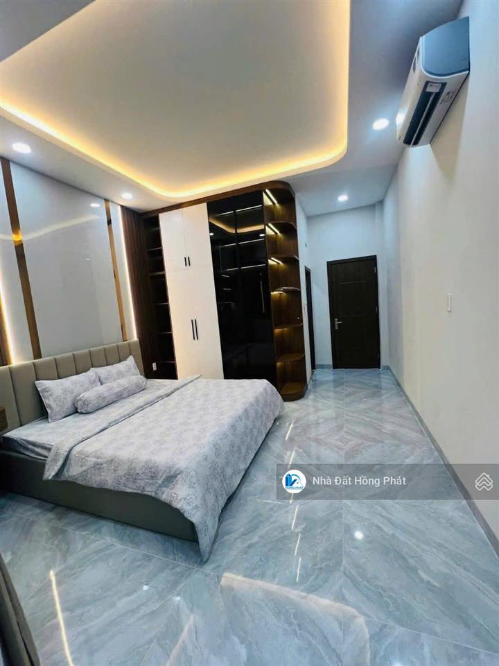 Nhà xinh 4m x 30m, mái đúc, đường thông 8m, gần chợ đại hải hóc môn