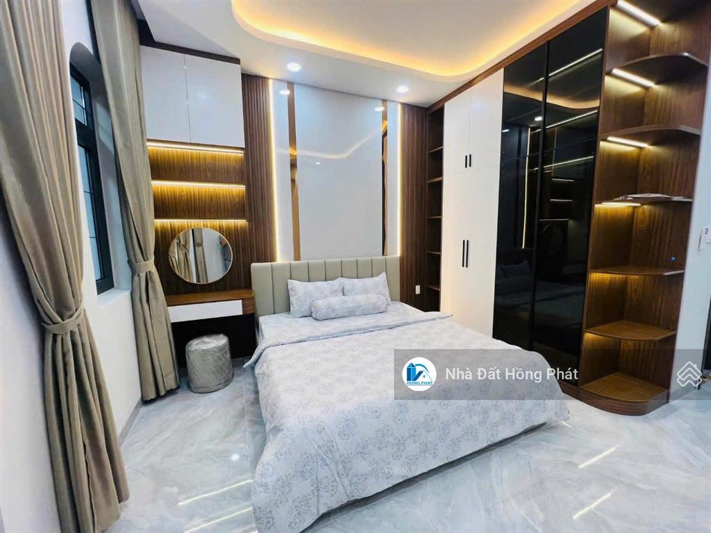 Nhà xinh 4m x 30m, mái đúc, đường thông 8m, gần chợ đại hải hóc môn