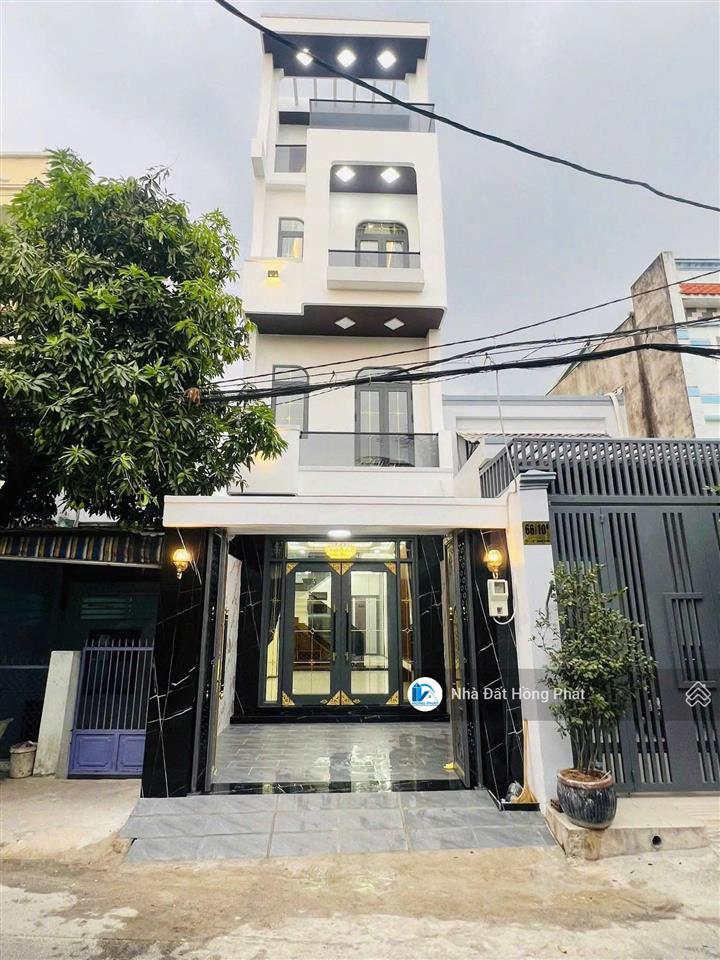 Nhà xinh 4m x 30m, mái đúc, đường thông 8m, gần chợ đại hải hóc môn