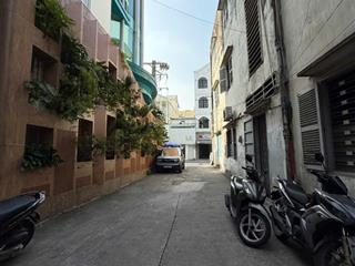 Building ngang 9m hiếm hẻm xe tải huỳnh văn bánh 189m thang máy cao cấp.