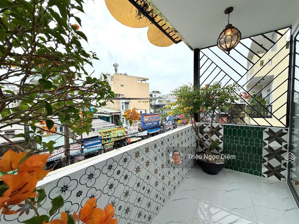 Gấp bán giảm 2 tỷ nhà mới mặt tiền kinh doanh sầm uất giá rẻ phan văn trị 4 tầng chỉ 10 tỷ