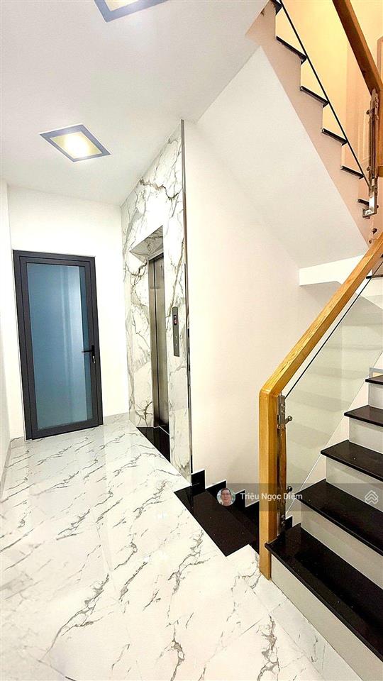 Nhà mới 5 tầng có thang máy thiết kế chdv 9 phòng mặt tiền diên hồng, bình thạnh chỉ 16 tỷ