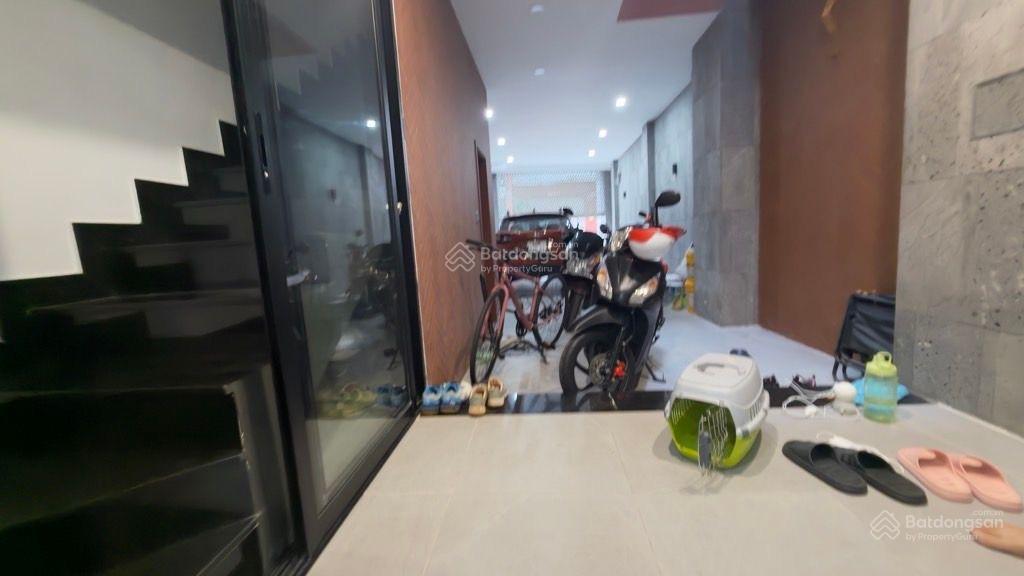 4 tầng đúc  lạc long quân tân bình  76m2 (4x19m) hẻm 8m  nhà thiết kế hiện đại có gara ô tô