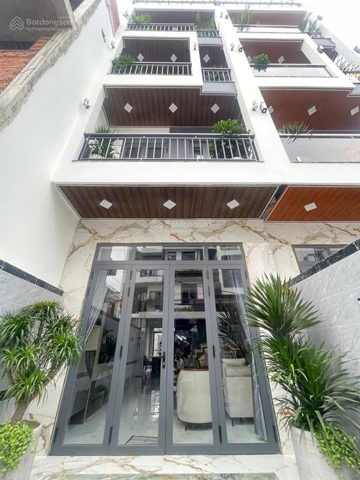 Nhà mới 100% 4 tầng  hẻm xe tải 6m thông  thới an, q12