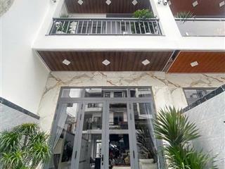 Nhà mới 100% 4 tầng  hẻm xe tải 6m thông  thới an, q12