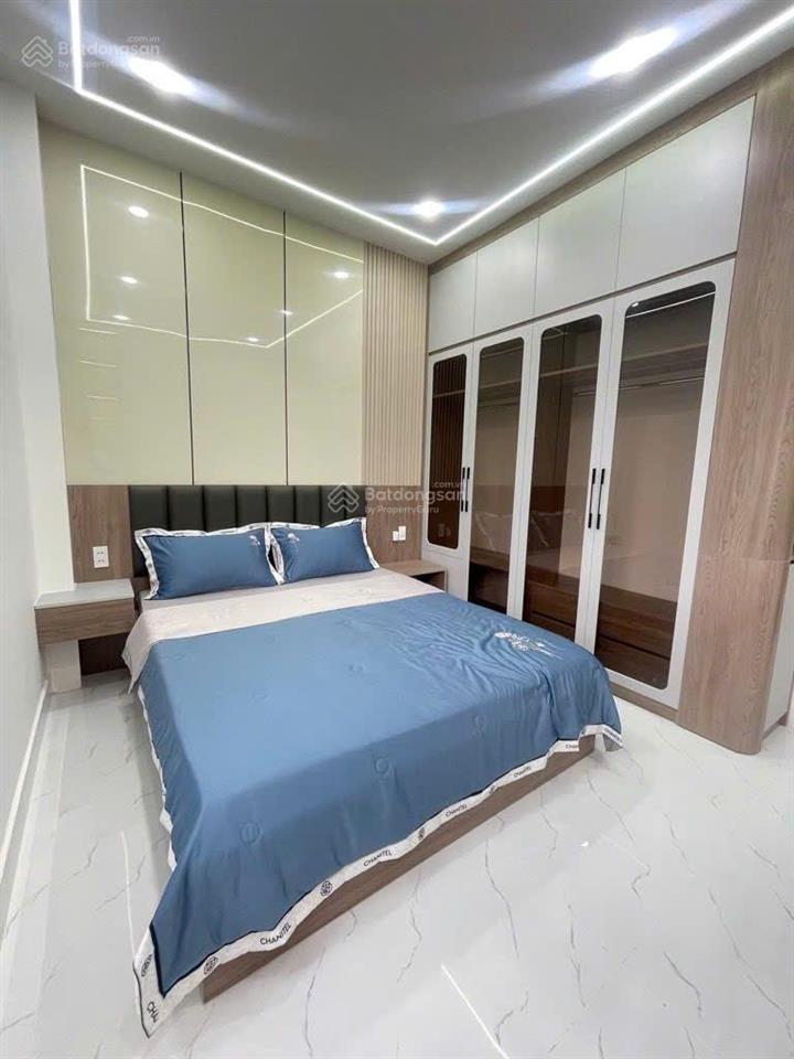 Nhà mới 100% 4 tầng  hẻm xe tải 6m thông  thới an, q12