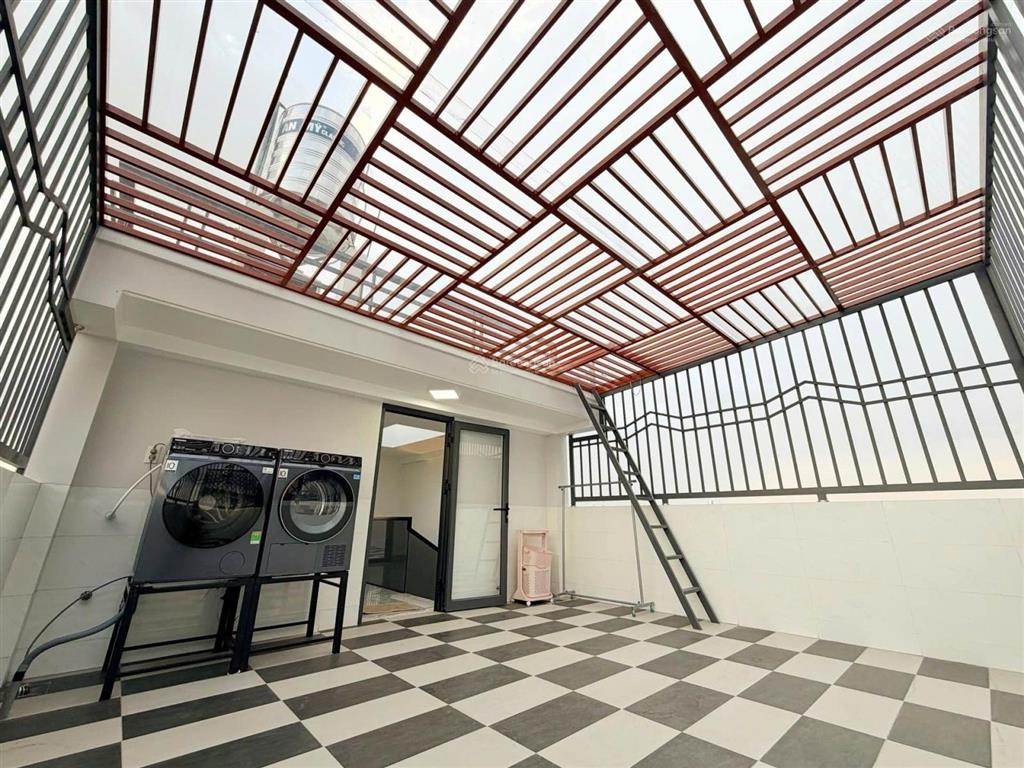 Bán nhà mặt tiền 4 tầng  ngang 5m  đậu oto bên trong  liền kề quận 7  sổ hồng riêng chỉ 9.x tỷ