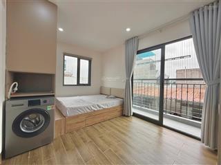 Khai trương căn hộ 34m2 ban công, giặt riêng tại nguyễn gia trí, gần hàng xanh, quận 1, tone gỗ mới