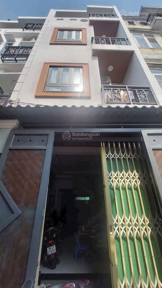 4tầng đs18.p8 gò vấp dt 50m(4x13m)sát mặt tiền xe hơi đậu sát nhà chỉ 6.7tỷ