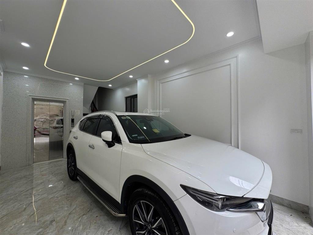 Nhà nguyễn văn trỗi  lô góc  thang máy  mặt ngõ thông kinh doanh  ô tô 4 chỗ vào nhà  16.8 tỷ