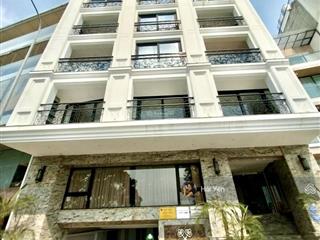 Apartment  mặt phố quảng khánh  125m x 6t  dòng tiền 10.000 usd/th  view hồ  giá 155 tỷ (tl)