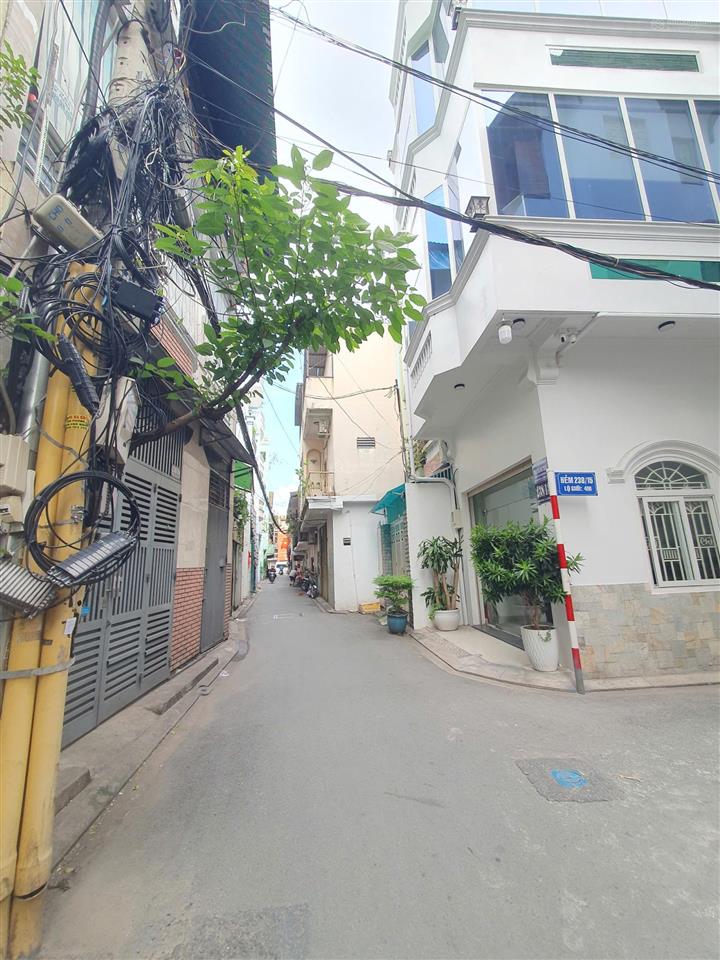 Ngộp nặng! cũ 14 tỷ = 11,5 tỷ tl  tòa nhà 5 tầng  lô góc 2mt khu sân bay  đáng mua!