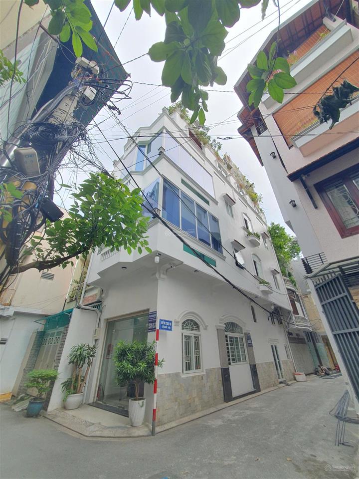 Ngộp nặng! cũ 14 tỷ = 11,5 tỷ tl  tòa nhà 5 tầng  lô góc 2mt khu sân bay  đáng mua!