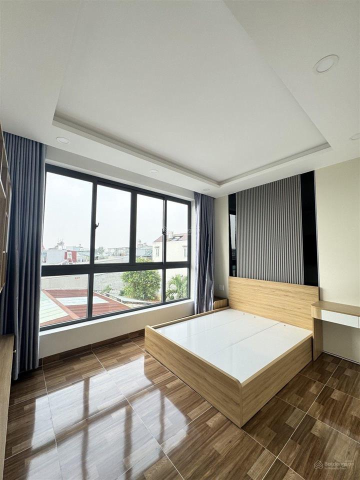 Bán nhà 4 tầng mới xây 60m24pn5wc đường 102 tăng nhơn phú a. ôtô 7 chỗ ngủ trong nhà. giá 6.5 tỷ.