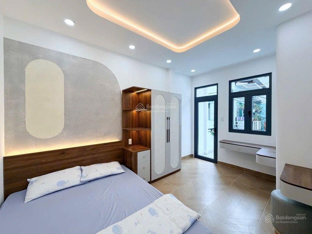 Nhà 4pn (có phòng dưới trệt) hẻm xe hơi đậu trước nhà nguyễn hữu cảnh p. 22 bình thạnh  6.x tỉ tl