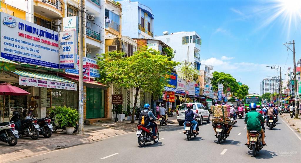 Nhà 70m2  4 tầng  10pn dòng tiền  1 bước ra xe hơi  gần hàng xanh  xô viết nghệ tĩnh  9.x tỉ