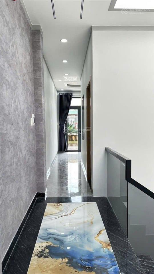 Nhà 1 trệt 2 lầu kdc phú mỹ hiệp dĩ an. vị trí đẹp đường thông  giá 4ty990