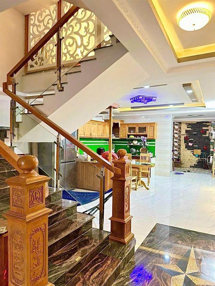 Bán nhà mặt tiền đuờng lê thị trung kinh doanh sầm uất an phú thuận an. dt 124m nhà 1trệt 3lầu