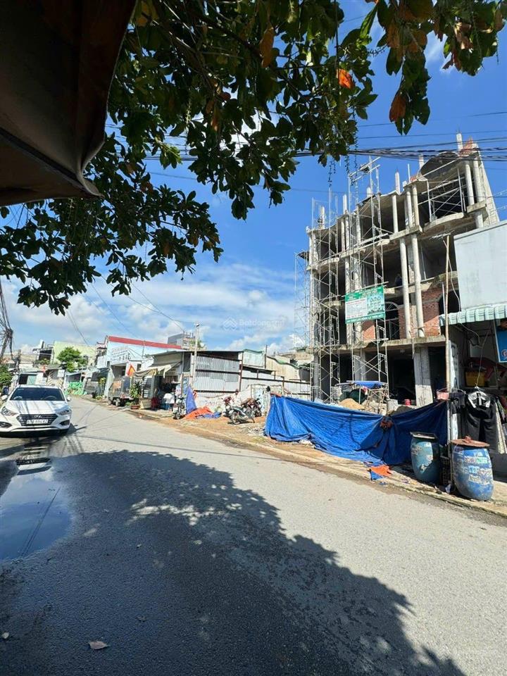 Bán nhà 1 trệt 3 lầu mặt tiền đường đông tác tân đông hiệp dĩ an. nhà đang hoàn thiện giá 7tỷ 450