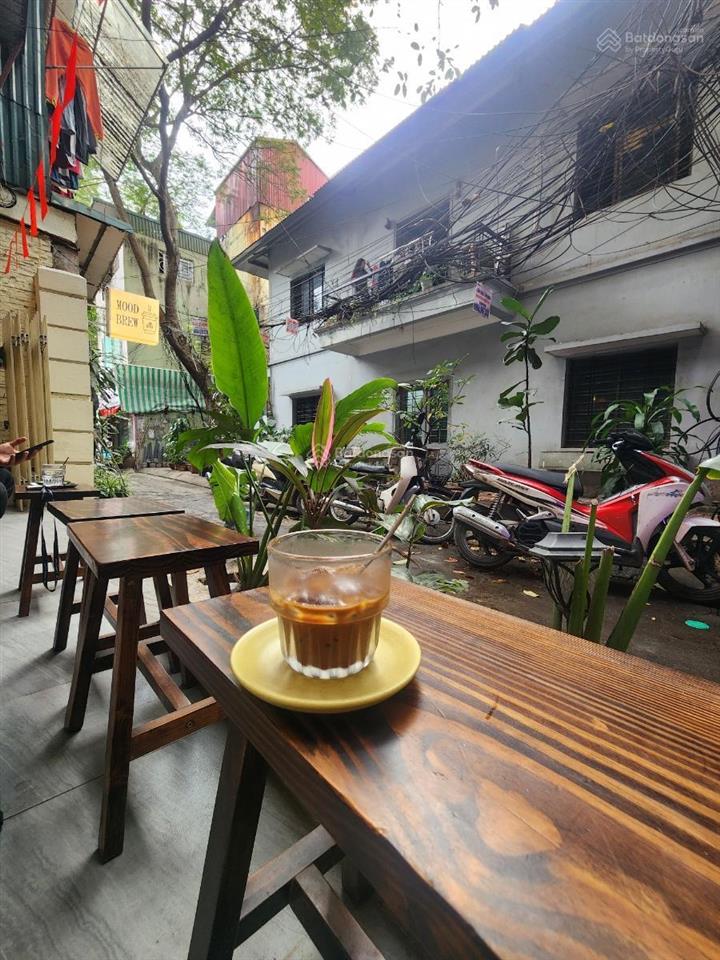Bán căn hộ tập thể giảng võ, tầng 1 kinh doanh, diện tích sổ rộng, 2 mặt trước sau, oto trước nhà
