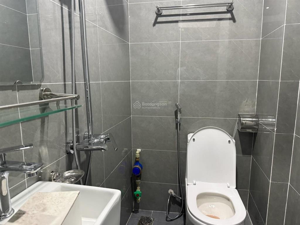 Bán tòa nhà chung cư mini phố núi trúc, xây mới 50m*8t, thang máy, 12 phòng, dòng tiền 1 tỷ/năm.