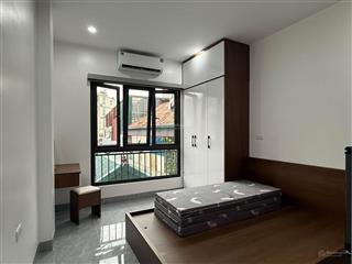 Bán tòa nhà chung cư mini phố núi trúc, xây mới 50m*8t, thang máy, 12 phòng, dòng tiền 1 tỷ/năm.