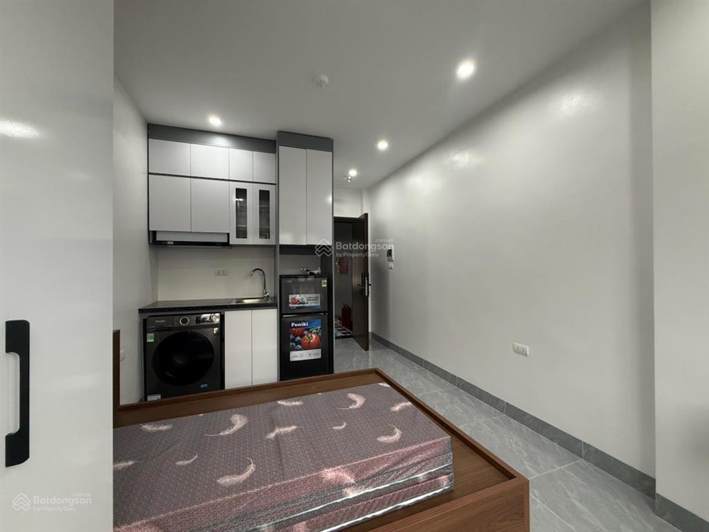 Bán tòa nhà chung cư mini phố núi trúc, xây mới 50m*8t, thang máy, 12 phòng, dòng tiền 1 tỷ/năm.