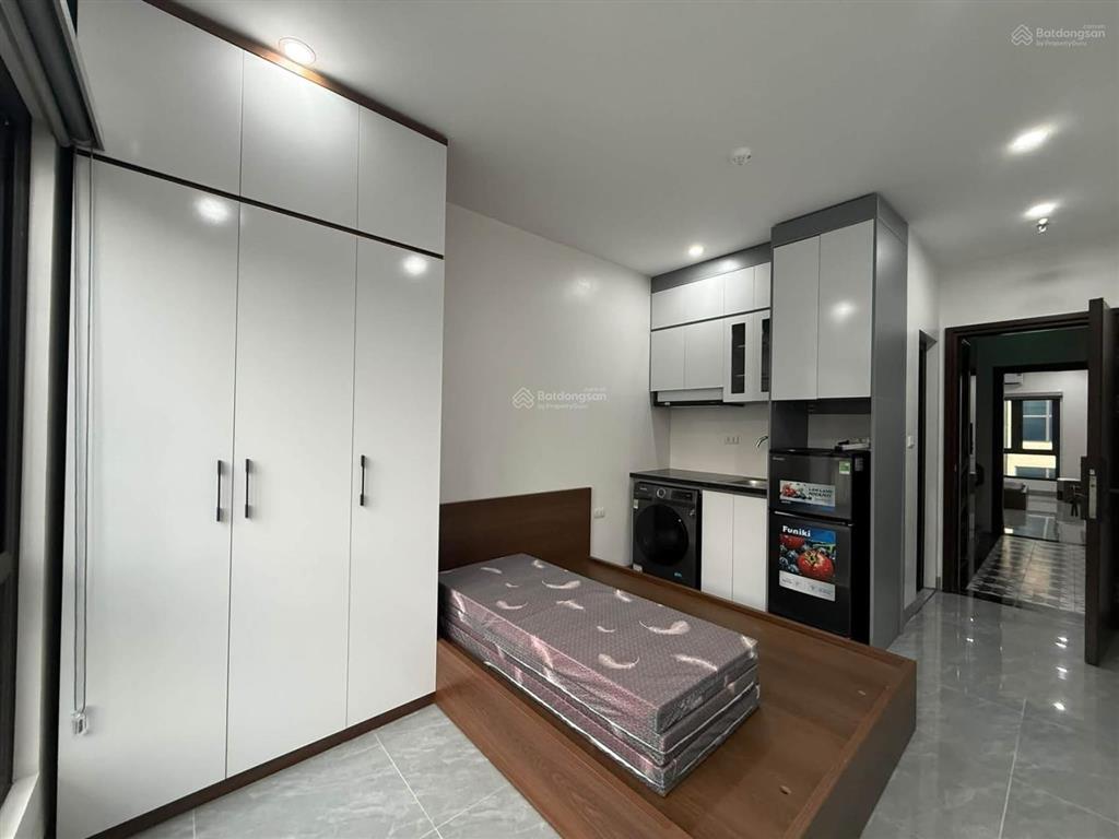 Bán tòa nhà chung cư mini phố núi trúc, xây mới 50m*8t, thang máy, 12 phòng, dòng tiền 1 tỷ/năm.