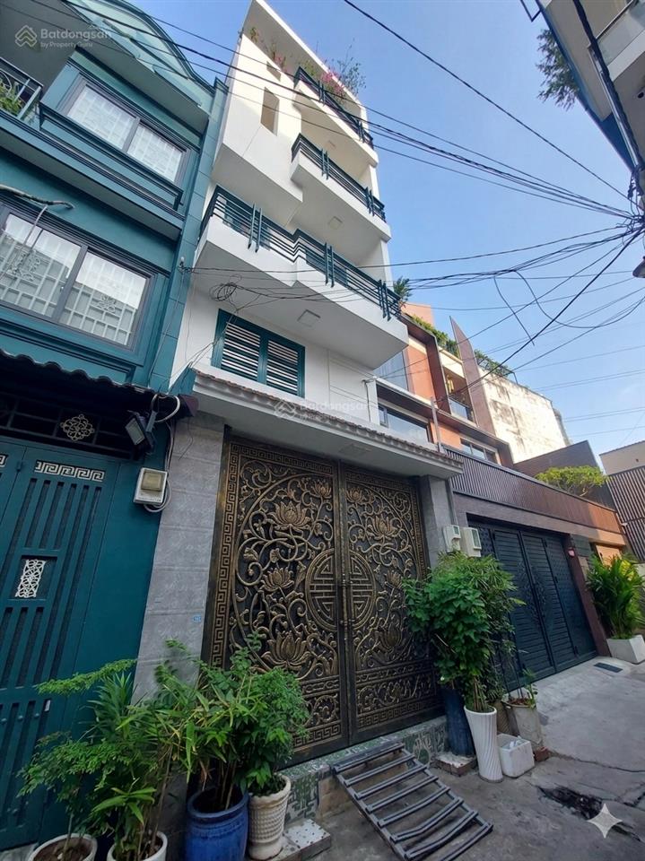 Nhà kiên cố 5 tầng vuông vức ngay hxh tân sơn nhì dt 4 x 18m sổ hồng hoàn công đầy đủ,dân trí cao