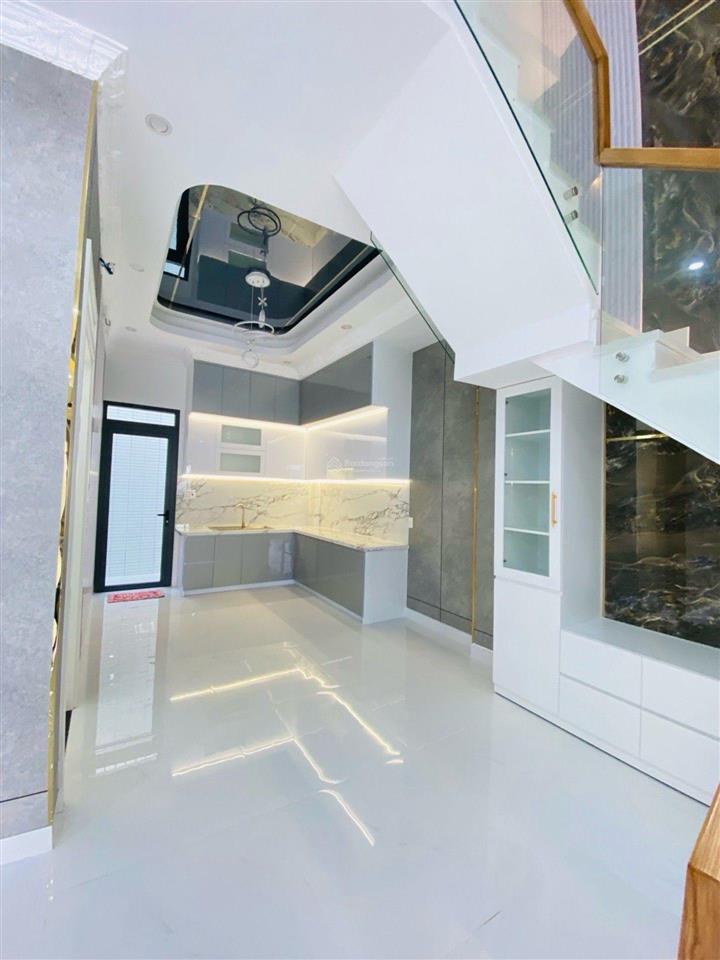 Bán tòa nhà mặt tiền kdc trung sơn hầm + 5 tầng + thang máy dt 200m doanh thu 140 triệu/tháng