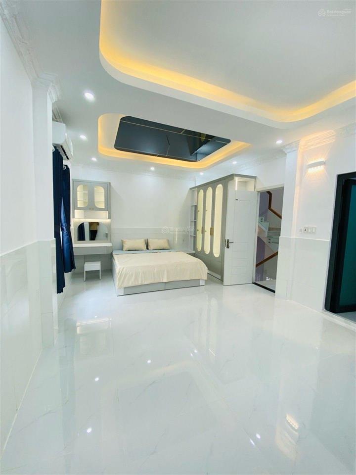 Bán tòa nhà mặt tiền kdc trung sơn hầm + 5 tầng + thang máy dt 200m doanh thu 140 triệu/tháng