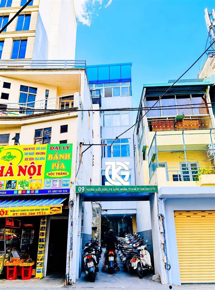Cho thuê nhà nguyên căn mặt tiền 1 trệt 4 lầu dt 8x18m nở hậu 12m,số 9 trương quốc dung, phú nhuận