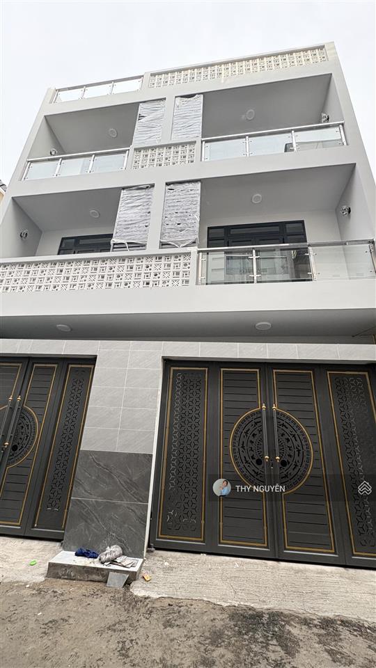 Nhà mới 4 tầng  xây kiên cố ngay phạm văn đồng  p linh tây tk ôtô vào nhà được  100.2m2 ngang 9m