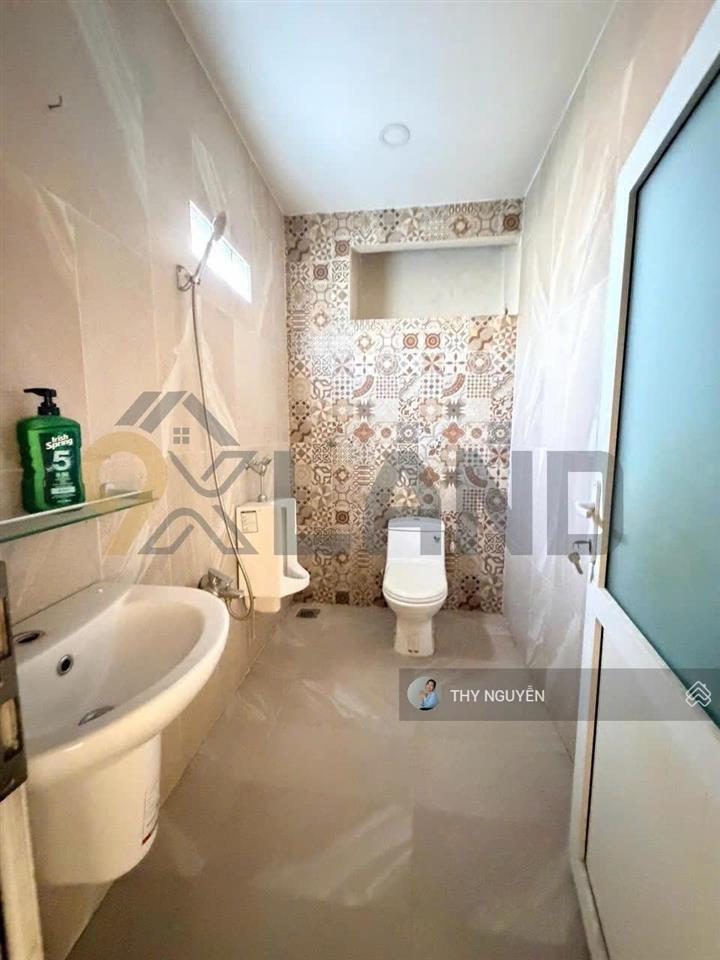 Nhà mới 4 tầng  xây kiên cố ngay phạm văn đồng  p linh tây tk ôtô vào nhà được  100.2m2 ngang 9m
