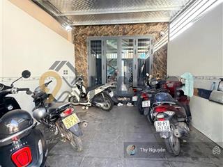 Nhà ở kèm chdv 5 tầng hxh xây mới  thu nhập 22 triệu  sau lưng đh ngân hàng sát kha vạn cân
