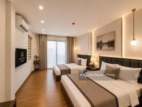 Khách sạn 3sao mp trần nhân tông,140m2x11t có hầm,dt 10tỷ/năm,đầy đủ pccc gpxd hoàn công,sổ vuông!